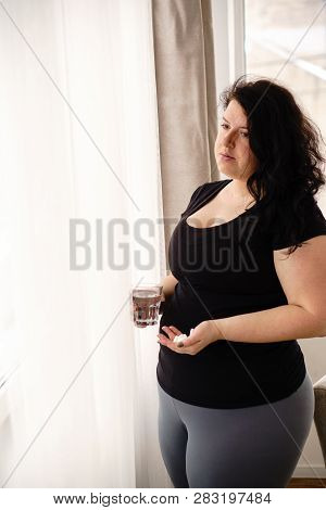 Weight Loss, Therapy, Hypertension, Diabetes, Migraine, Medical Concept. Depressed Desperate Fat Wom