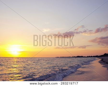 Playa Ancón, Espíritu Santo, Cuba - June 28, 2018: Spectacular Sunset On The Ancon Beach With All Go