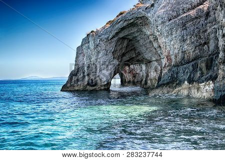 Blue Caves On The Sea In Zakynthos In Greece. Clear Water Of Medditerian Sea In Sunny Day At Summer.