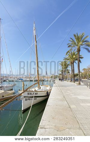 Moored Boats Along The Paseo Maritimo On A Sunny Winter Day