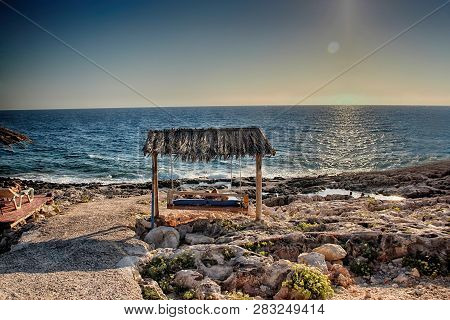 Sunset On The Romantic Porto Roxa Beach In Zakynthos, Greece.