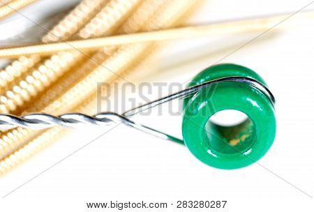 Strings For Guitar Isolated On A White Background. Macro