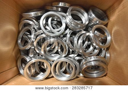 Round Rings With Internal Thread For Valve Manufacture In The Factory. Many Round Rings For Industri