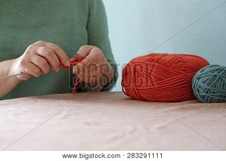 Women Knitts. Hands And Knit. Color Thread. Color Concept.