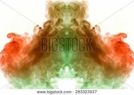 Water-smoky Substance On A White Background Of Fiery Orange And Green Color In The Form Of The Head 