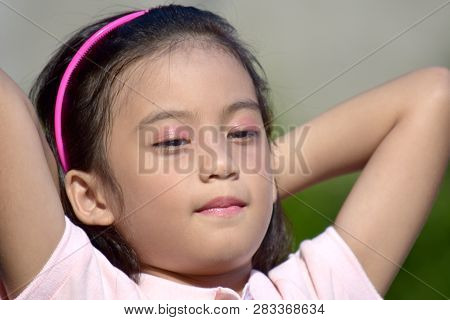 A Petite Girl Relaxing