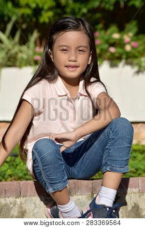 A Minority Girl Sitting