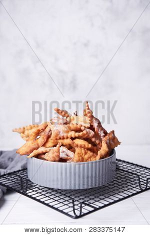 Brushwood - Russian Traditional Cookies With Powdered Sugar. Food Consept. Plate With Hvorost On Whi