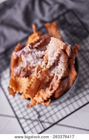 Brushwood - Russian Traditional Cookies With Powdered Sugar. Food Consept. Plate With Hvorost On Whi