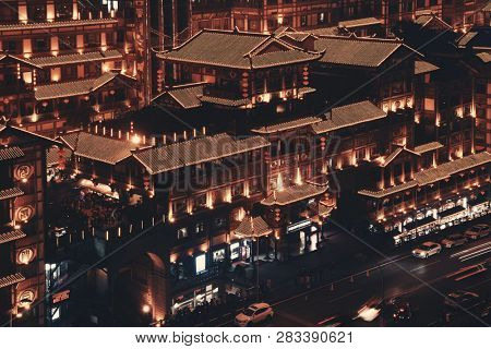 CHONGQING, CHINA â MARCH 13: Hongyadong shopping complex at night on March 13, 2018 in Chongqing. With 17M population, it is the most populous Chinese municipality.