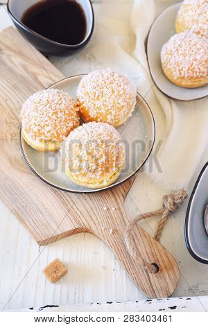 French Dessert Pastry. Mini Tartes Tropezienne On Liight Background. Top View