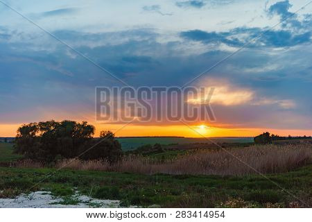 Evening Orange Sunset Over Valday Lake, Russia Nature Landscape Photography. Autumn Sunset, Outdoor 