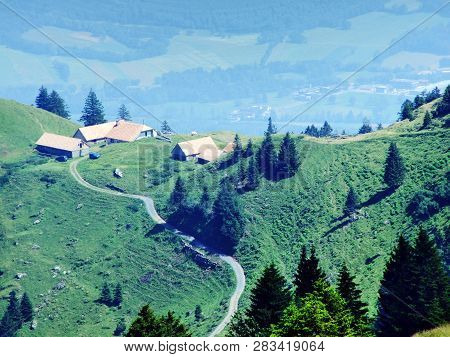 Alpine Livestock Farms And Stables On The Slopes Of Alvier Mountain In The Appenzell Alps Mountain R