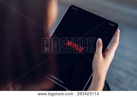 Bangkok, Thailand - March 11, 2019 : Women Use Netflix App On Ipad Pro Screen. Netflix Is An Interna
