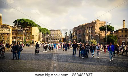 Rome, Italy - October 22nd: Tourist Walk Along Via Dei Fori Imperiali Leading To The Colosseum At Th