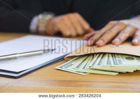 Business Man Signing A Contract. Owns The Business Sign Personally,director Of The Company, Solicito