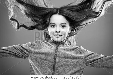 Kid Girl Long Healthy Shiny Hair. Little Girl Grow Long Hair. Teaching Child Healthy Hair Care Habit