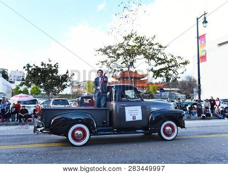LOS ANGELES - FEBRUARY 9, 2019: Congressman Jimmy Gomez fires a confetty cannon during the LA Chinese New Year Parade.