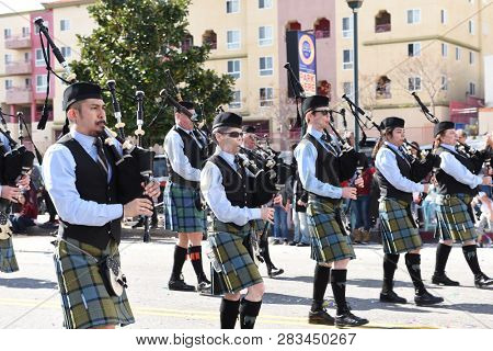 LOS ANGELES - FEBRUARY 9, 2019: Bagpipers from the Pasadena Scots march and play in the Los Angeles Chinese New Year Parade.