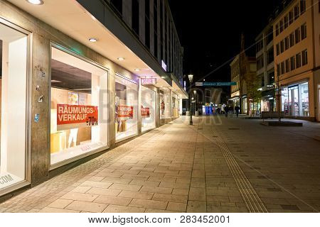 DUSSELDORF, GERMANY - CIRCA SEPTEMBER, 2018: shopwindow of a store in Dusseldorf at night.
