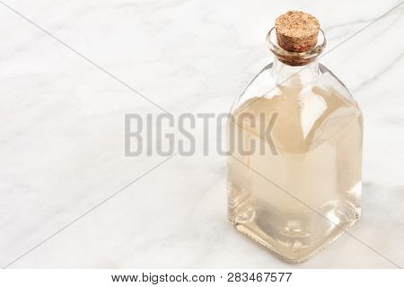 A Corked Bottle Of Homemade Rosewater Face Tonic With A Place For Text