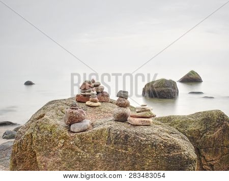 Stack Of Pebble Stone On Shingle Beach. Pile Of Stacked Stones On The Beach, Colorful Pebles Coast.