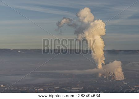Sunrise On Boren Hill Near Bilina Town In Winter Frosty Color Morning