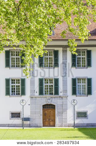 The Buildings Of The Castle Church In Interlaken. The Courtyard Of The Castle Church