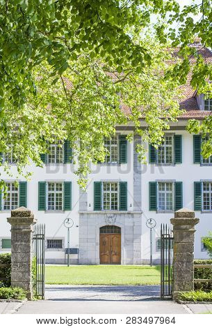 The Buildings Of The Castle Church In Interlaken. The Courtyard Of The Castle Church
