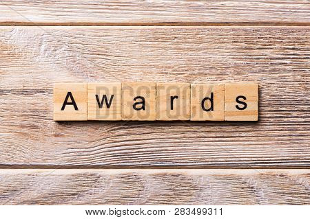 Awards Word Written On Wood Block. Awards Text On Wooden Table For Your Desing, Concept