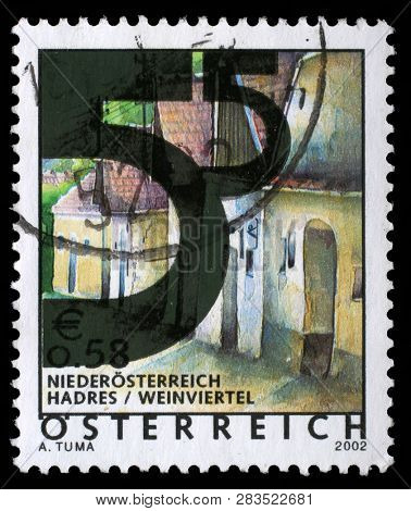 ZAGREB, CROATIA - SEPTEMBER 09, 2014: A stamp issued in the Austria shows Wine cellars in Hadres, Lower Austria, Overprinted with new Design, circa 2005.