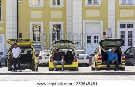 Taxi Drivers Waiting For Clients By Railway Station Burgas / Bulgaria / 04.26.2018 / Drivers Of Yell