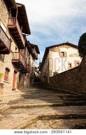 Narrow Street Of The City Of Rupit With Steps Carved Into The Volcanic Rock, Catalonia, Spain