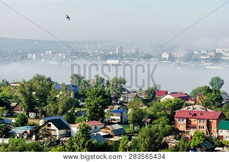 Irkutsk, Russia - July 8, 2013: Panoramic Top View The City Of Irkutsk On Sunny Summer Day With Fog