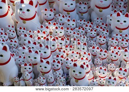 Cute Neko Charm Statue Inside Gotokuji Temple (neko Temple) In Tokyo, Japan.