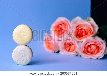 Two Sweet Pasta And A Bouquet Of Roses Can Be Coral In Color On A Purple Background. Coral Color Is 