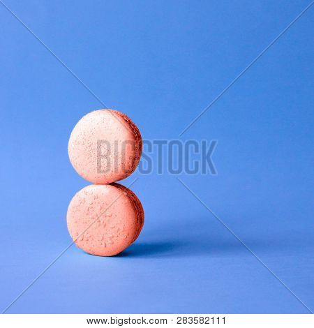 Two Macaroon Coral Color Imitating The Number 8. Coral Color Is The Color Of 2019. March 8 Womens Da