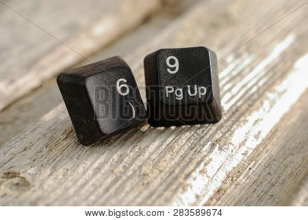 Sexy Numbers 69 Computer Keyboard Buttons On Old Wood Background