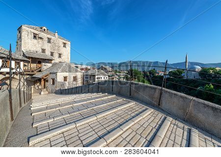 View From The Old Bridge With Koski Mehmet Pasha Mosque Visible In The Background In Mostar, Bosnia 