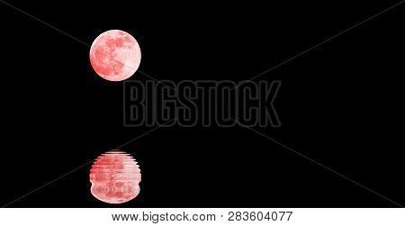 Red Big Full Moon With Reflection On The Water At Midnight And Black Sky