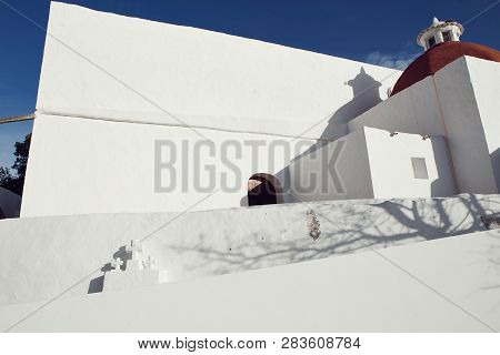 Mediterranean Traditional Architecture In Ibiza: Beautiful Church Of Santa Eularia Des Riu In Ibiza 