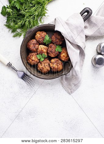 Homemade Beef Meatballs In Frypan On White Background