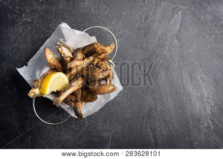 Seafood. Small Sea Fish, Deep Fried Anchovies. Top View With Copy Space