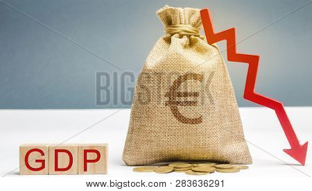 Money Bag With The Word Gdp And Down Arrow. Decline And Decrease Of Gdp - Failure And Breakdown Of E