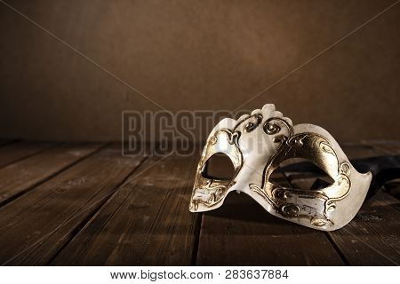 Stll Life Of A Carnival Mask On A Wood Floor