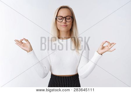 Female Entrepreneur Having Break Meditation To Release Negativity And Bad Emotions Practicing Yoga B
