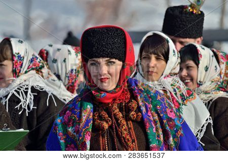 Chernivtsi, Ukraine - January 13, 2019: Young Hucul Woman Performs Malanka Song During The Ethnic Fe
