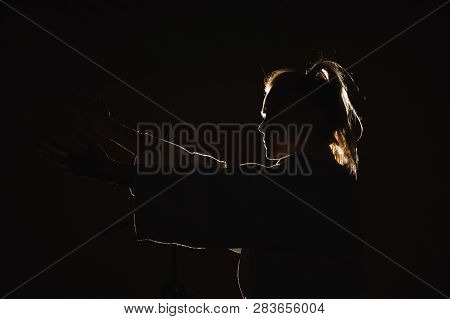 Young Girl Dressed In Hakama Practicing Aikido.