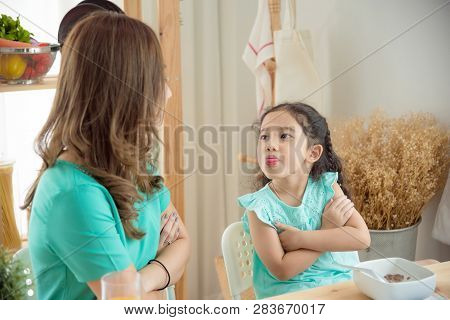 Little Asian Girl Refuse To Having Breakfast With Her Mother,picky Eater Concept.
