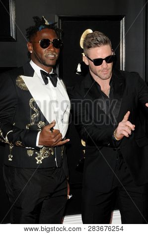 LOS ANGELES - FEB 10:  Devin McCourty, Julian Edelman at the 61st Grammy Awards at the Staples Center on February 10, 2019 in Los Angeles, CA